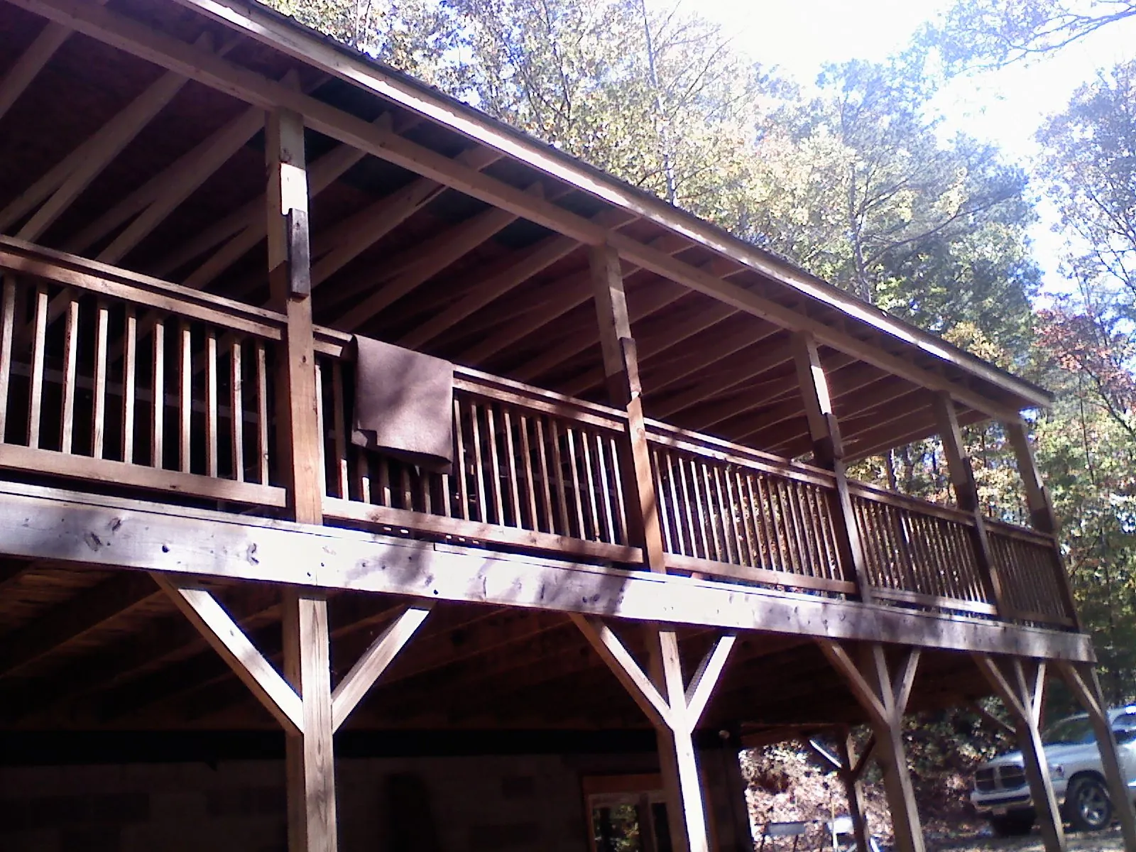 Timber framing under a new elevated porch and deck — Roof Leak Repair in Fort Worth by Roofing Brothers